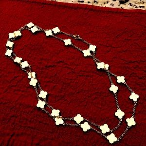 Beautiful gold tone, and cream colored necklace